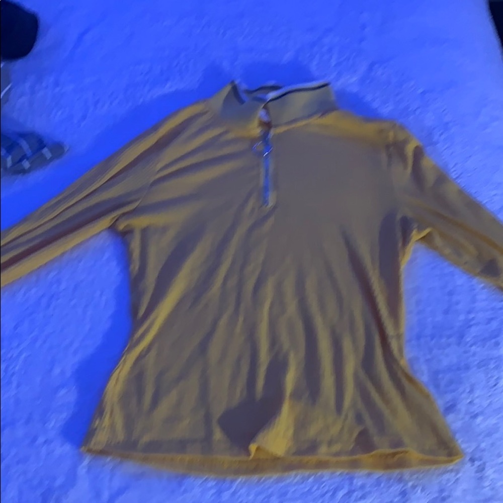 A yellow long sleeve shirt